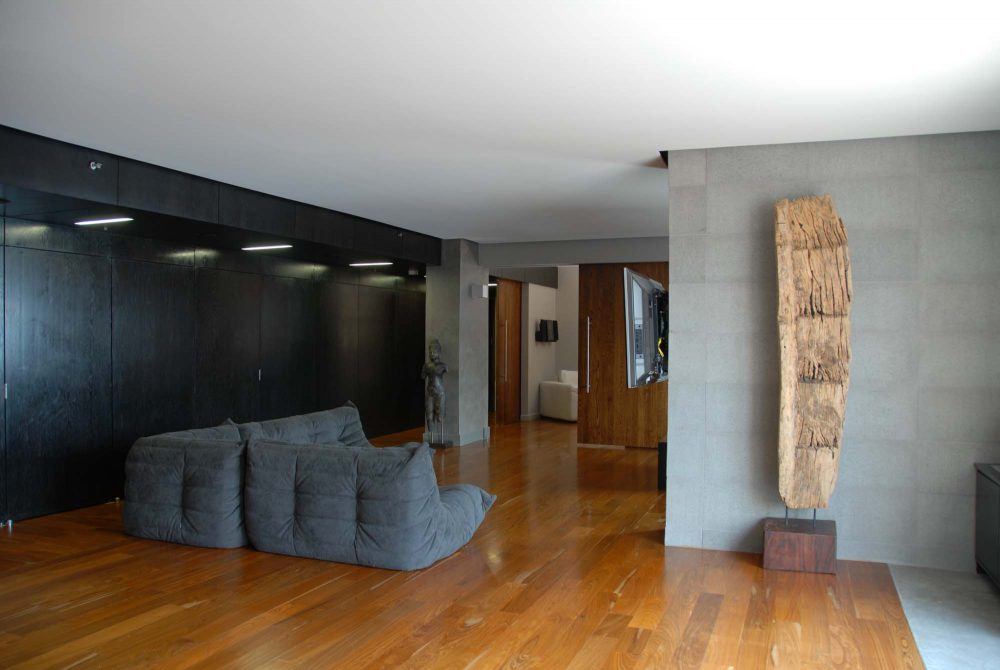 Apart from acting as a living room, the main space is a place for the clients to display their collection of art objects